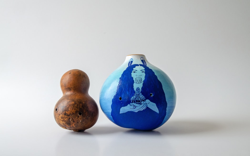 Kōauau pongā ihu (left) and kōauau waha (right). Descendants of Hinepūtehue; wind instruments. Measuring 9.5 and 12cms tall. Made by Brian Flintoff, and Jen and David Cattermole, respectively.