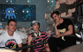Josh Rundle (bass), Cameron McCurdy (vocals, drums, trumpet), Mitchell Baber (vocals, guitar)