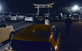 People evacuate to Hiyoriyama mountain in Ishinomaki City, Miyagi prefecture on 17 March 2022 after a powerfule 7.3 earthquake jolted Japan's northeastern coast.