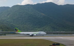 A Boeing 747-428F(ER) freight plane of ''AirAct'' is queuing up for takeoff at Hong Kong International Airport in Hong Kong, China, on May 18, 2024. (Photo by Marc Fernandes/NurPhoto) (Photo by Marc Fernandes / NurPhoto via AFP)