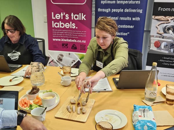 Judging the Supreme Winner in the 2025 Great NZ Sausage Competition.