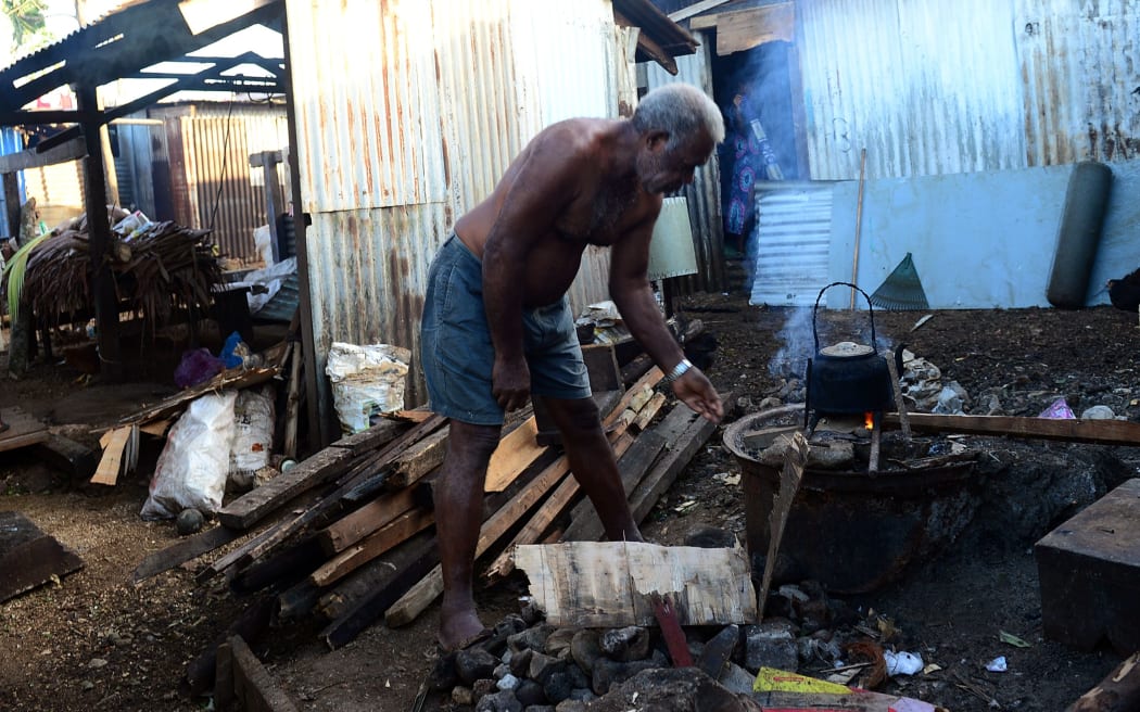 Residents clean up their homes in Port Vila.