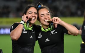 Stacey Fluhler of New Zealand and Theresa Fitzpatrick of New Zealand celebrate with their winners medals.