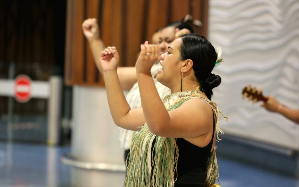 International tourists from visa-waiver countries are welcomed with waiata on their return to New Zealand, 2 May 2022.
