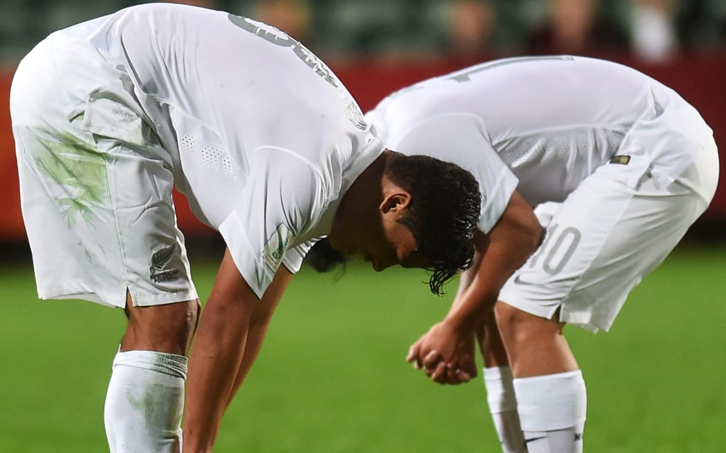 Junior All Whites players looking dejected after their heavy loss to the United States.