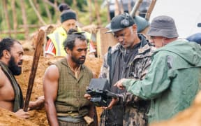 Director Michael Jonathan discusses a shot with DOP Grant McKinnon