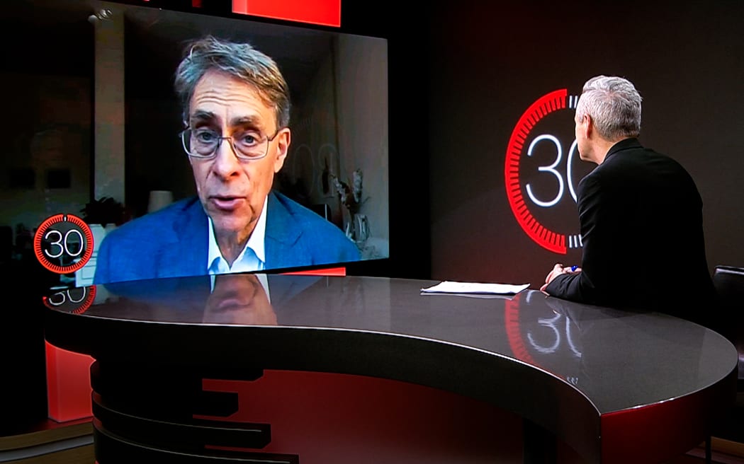 Kenneth Roth appears via remote link in studio for an interview on season 3 of 30 with Guyon Espiner.
