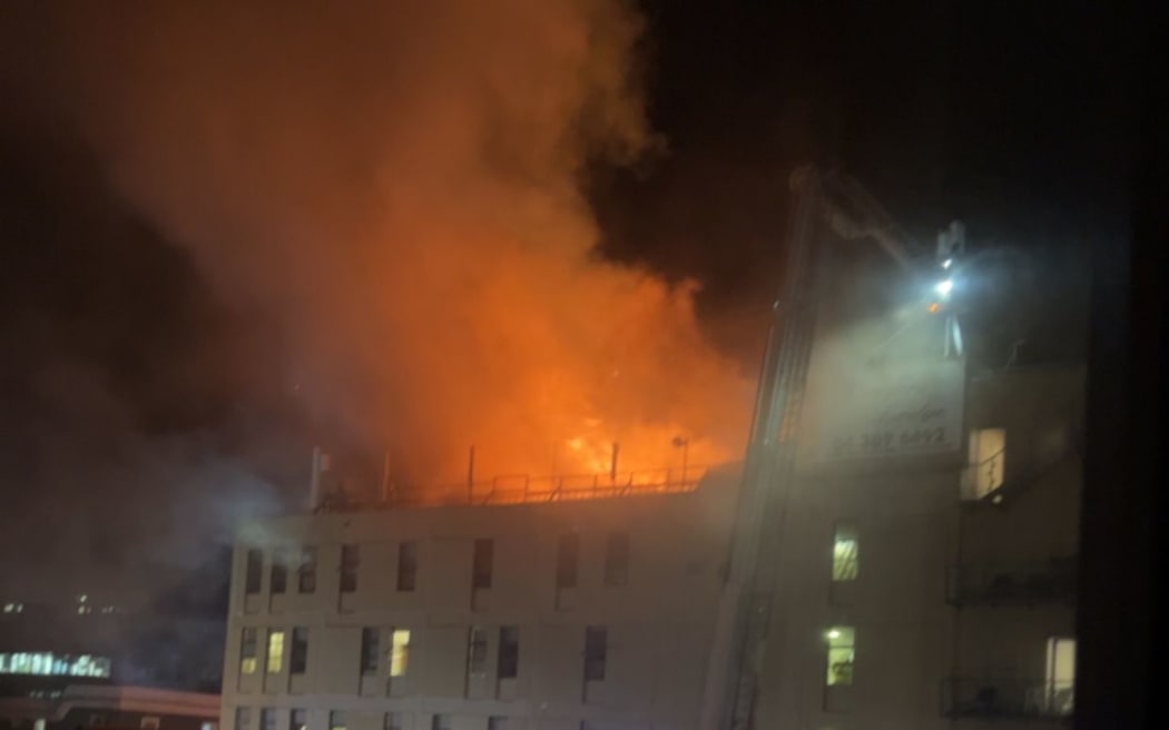 Flames and smoke billow from the Loafers Lodge in Adelaide Road, Newtown, on 16 May 2023.