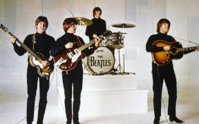 Au secours!
Help!
1965
directed by Richard Lester
John Lennon, 
George Harrison, 
Paul McCartney 
Ringo Starr.
COLLECTION CHRISTOPHEL / RnB © United Artists / Walter Shenson Films / Subafilms (Photo by United Artists / Walter Shenson / Collection ChristopheL via AFP)