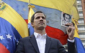 Venezuela's National Assembly head Juan Guaido declares himself the country's "acting president" during a mass opposition rally.