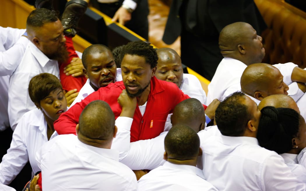 Security officials force out members of the opposition party, the Economic Freedom Fighters.
