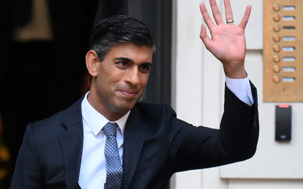 New Conservative Party leader and incoming prime minister Rishi Sunak waves as he leaves from Conservative Party Headquarters in central London having been announced as the winner of the Conservative Party leadership contest, on 24 October 2022.