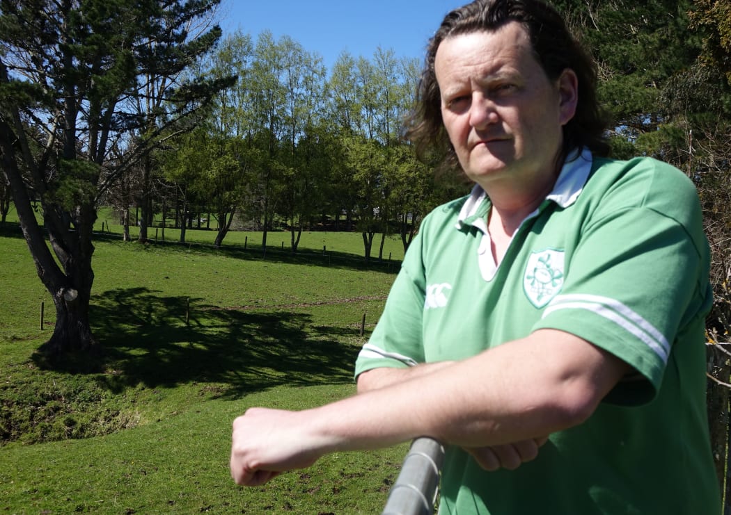 Eltham resident Mark Kelly believes he may have been poisoned by fumes from three million litres of dairy products dumped at a wastewater plant.