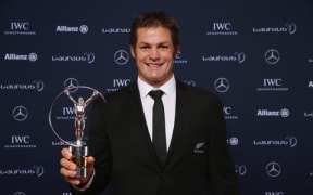Richie McCaw with the All Blacks Laureus team award.