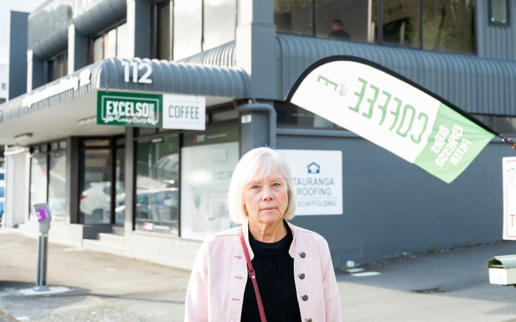 Excelso Coffee Roasters owner Carrie Evans said sales have dropped at her Third Ave business because of new parking charges in the area.