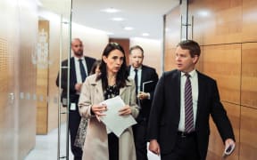 Prime Minister Jacinda Ardern and Covid-19 Response Minister Chris Hipkins heading to a post-Cabinet conference.