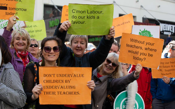 Teachers march on Queen Street in a bid for better pay rates.