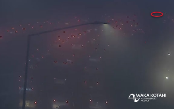 An image from Waka Kotahi showed the site of a crash on Auckland's southern motorway as dense fog covered the city.