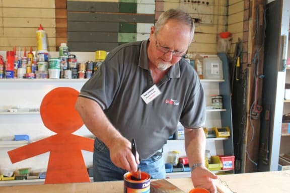 This image shows "Shed Boss" Peter Schenker at work