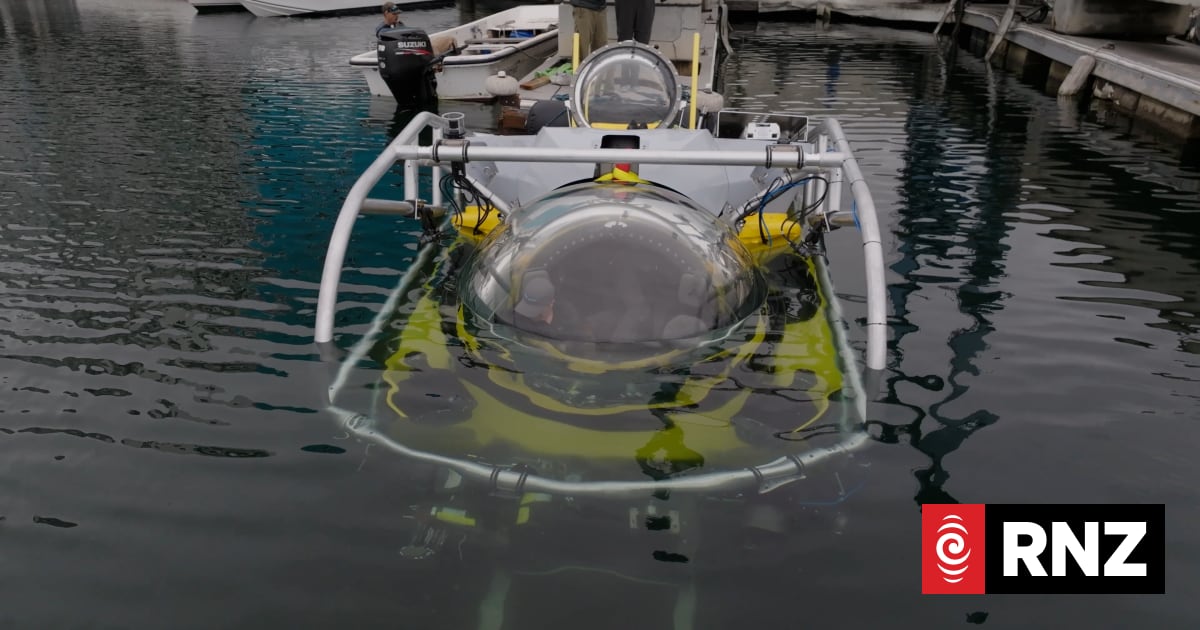 Baited cameras and submersible with robotic arm surveying Tuvalu waters ...