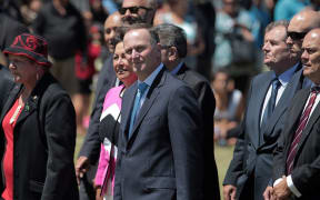 Prime Minister John Key (centre) with National MPs at Ratana Pa.