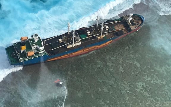 This file photo from January 2019 shows the fishing supply vessel Ou Ya Leng 6 hard aground on the reef at Taka Atoll in the northern Marshall Islands, where it remains today. Photo: US Coast Guard.