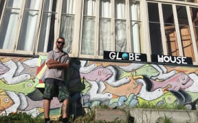 Enrico Cornuda and his mural