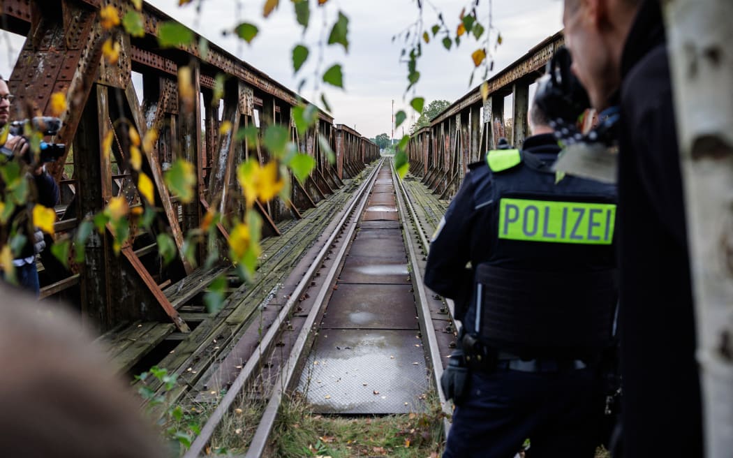 deral Police officers stand by a frequently used route by migrants across the German-Polish border near Forst, eastern Germany on October 11, 2023, during a patrol near the border with Poland. Germany will extend temporary controls to all of its borders to crack down on irregular migration into the country, a government source told AFP on September 9, 2024. (Photo by JENS SCHLUETER / AFP)