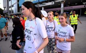 Security move ticketless fans of Taylor Swift away from the Melbourne Cricket Ground before the first of Swift's three shows in Melbourne on 16 February, 2024. (Photo by William WEST / AFP)
