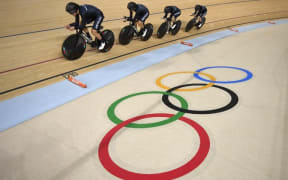 Rushlee Buchanan, Lauren Ellis, Jaime Nielsen and Racquel Sheath cycle during the women's Team Pursuit first round.