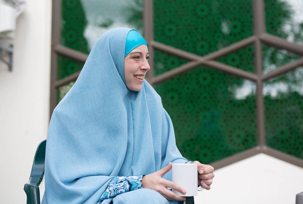 Megan Lovelady, 22, of Christchurch outside Al-Noor mosque.