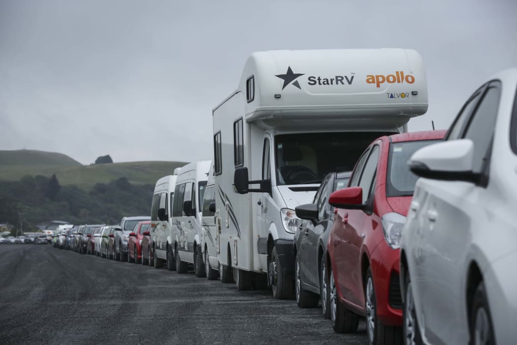 Hire cars line up around the race track in Kaikoura.