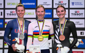 Women's Scratch Race Podium - Lorena Wiebes (Netherlands) on the podium receiving the Gold Medal with Jennifer Valente (USA) receiving the Silver Medal with Ally Wollaston (New Zealand) receiving the bronze. 2024 Track Cycling World Champs, Denmark. Picture by Simon Wilkinson/SWpix.com.