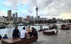 Crowds begin to gather to watch fireworks at Auckland's Sky Tower.