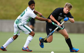 Blackstick Sam Lane is tackled high during the Test in Wellington.
