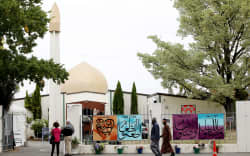 Members of the Muslim community arrive at the Al Noor mosque on the 15 March 2020, the anniversary of the terror attack.