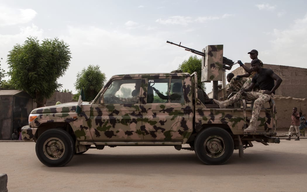 A Nigerian army vehicle patrols in the town of Banki in northeastern Nigeria on April 26, 2017.