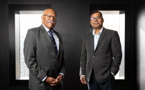 Fiji Prime Minister Sitiveni Rabuka, left, and Deputy PM and Finance Minister Biman Prasad.