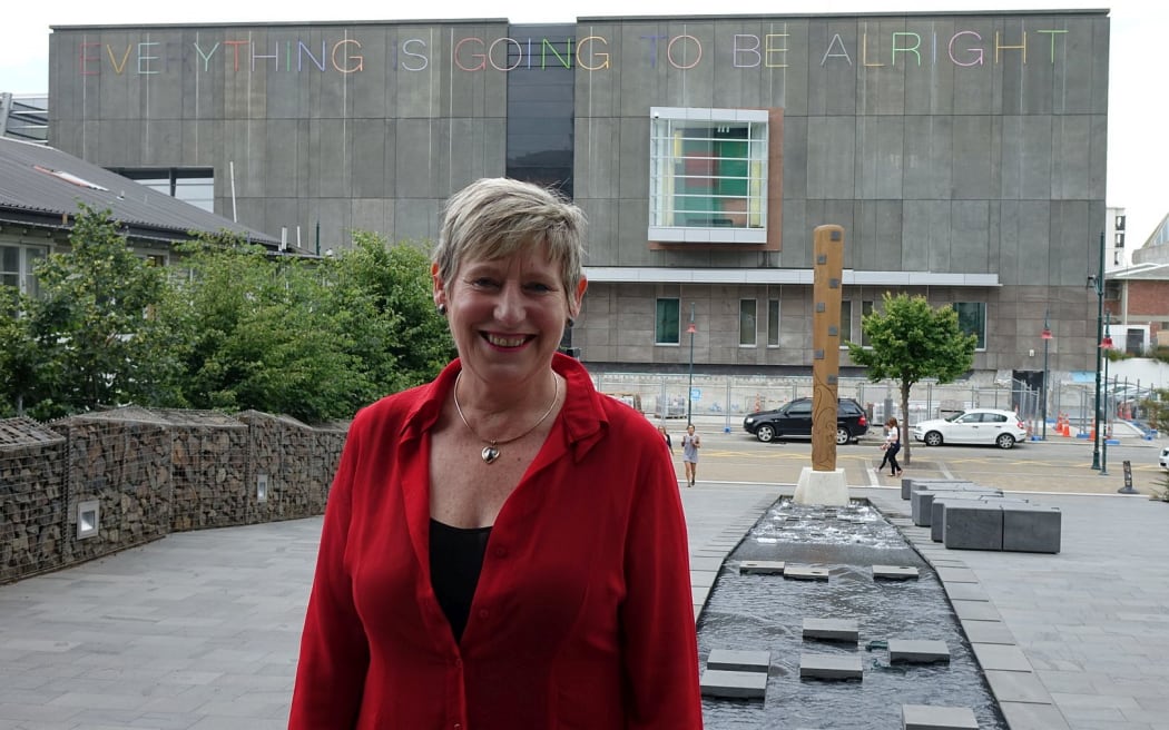 Lianne Dalziel,stands across the road with newly re-opened Art Gallery behind
