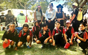 A group of kaiako (teachers) and students from Te Kura o Waikare sat quietly among the masses gathered at Waitangi celebrations today