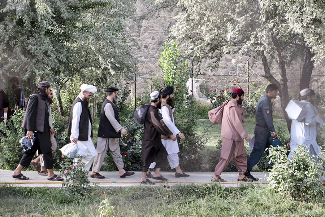 Taliban prisoners in the process of being released from Pul-e-Charkhi prison on the outskirts of Kabul on August 13, 2020.