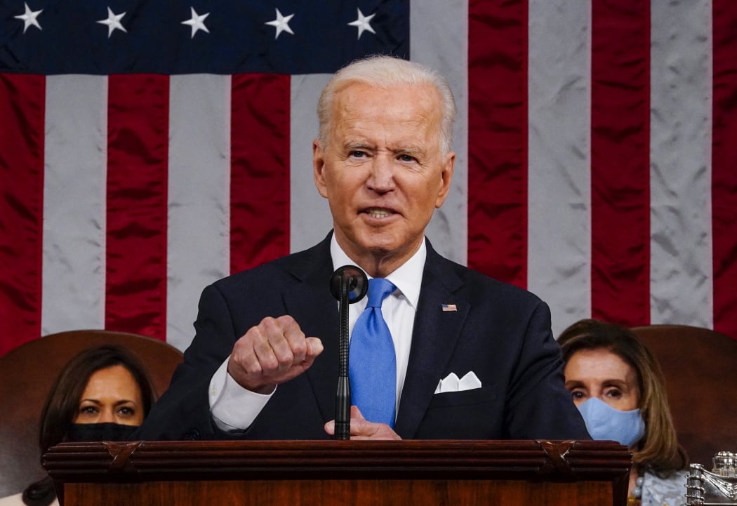 US President Joe Biden addresses a joint session of Congress in the House chamber of the US Capitol 28 April 2021 in Washington, DC.