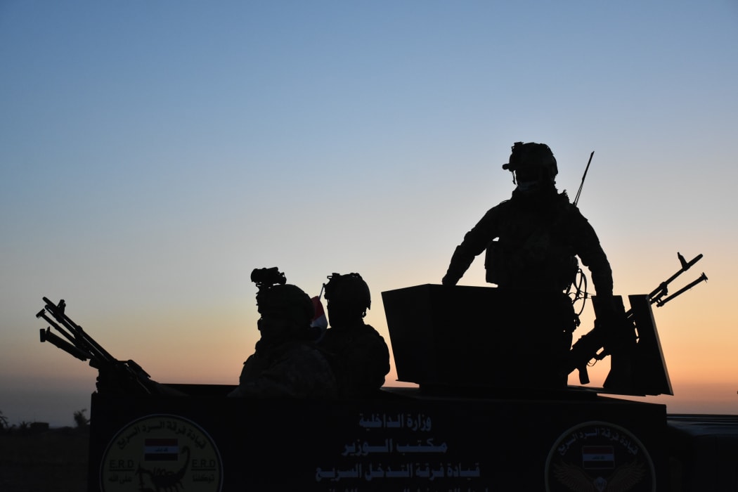 The strikes were in retaliation for a rocket attack on an Iraqi base in Kirkuk where Iraqi soldiers are pictured here.