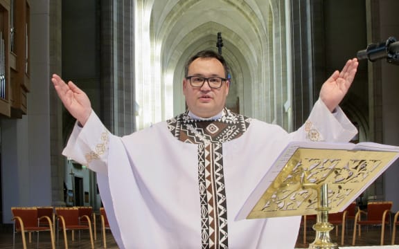 Reverend Ivica Gregurec with hands outstretched