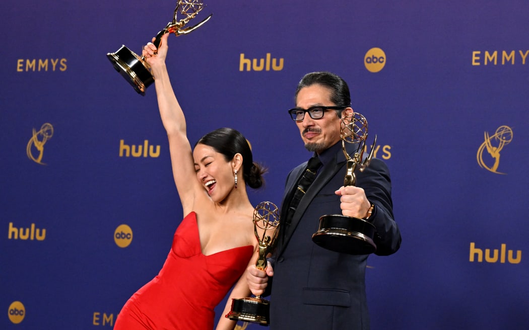 Japanese actress Anna Sawai (L) winner of the Outstanding Lead Actress in a Drama Series award for "Shogun" and Japanese actor Hiroyuki Sanada winner of the Outstanding Lead Actor in a Drama Series award for "Shogun" pose in the press room during the 76th Emmy Awards at the Peacock Theatre at L.A. Live in Los Angeles on September 15, 2024. (Photo by Robyn Beck / AFP)