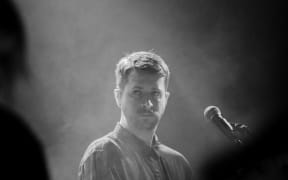 Josh Fountain onstage with Leisure at Auckland's Powerstation