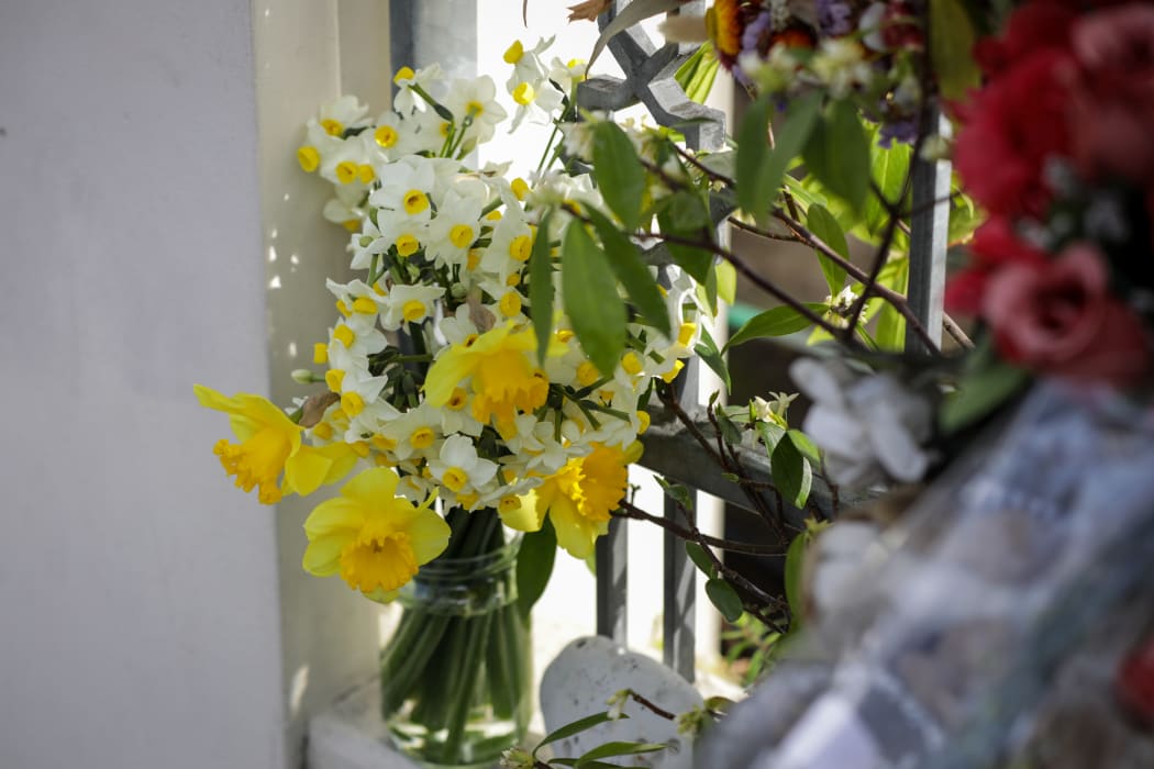 Flowers left at the first Friday prayers after sentencing.