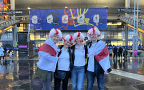 Fans turn out on a wet French evening for the Rugby World Cup semi-final between England and South Africa.