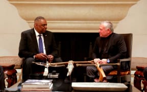 A handout picture released by the Jordanian Royal Palace shows King Abdullah II (R) meeting with US Secretary of Defence Lloyd Austin in Amman on March 5, 2023. (Photo by Jordanian Royal Palace / AFP) / RESTRICTED TO EDITORIAL USE - MANDATORY CREDIT "AFP PHOTO / JORDANIAN ROYAL PALACE / YOUSEF ALLAN" - NO MARKETING NO ADVERTISING CAMPAIGNS - DISTRIBUTED AS A SERVICE TO CLIENTS