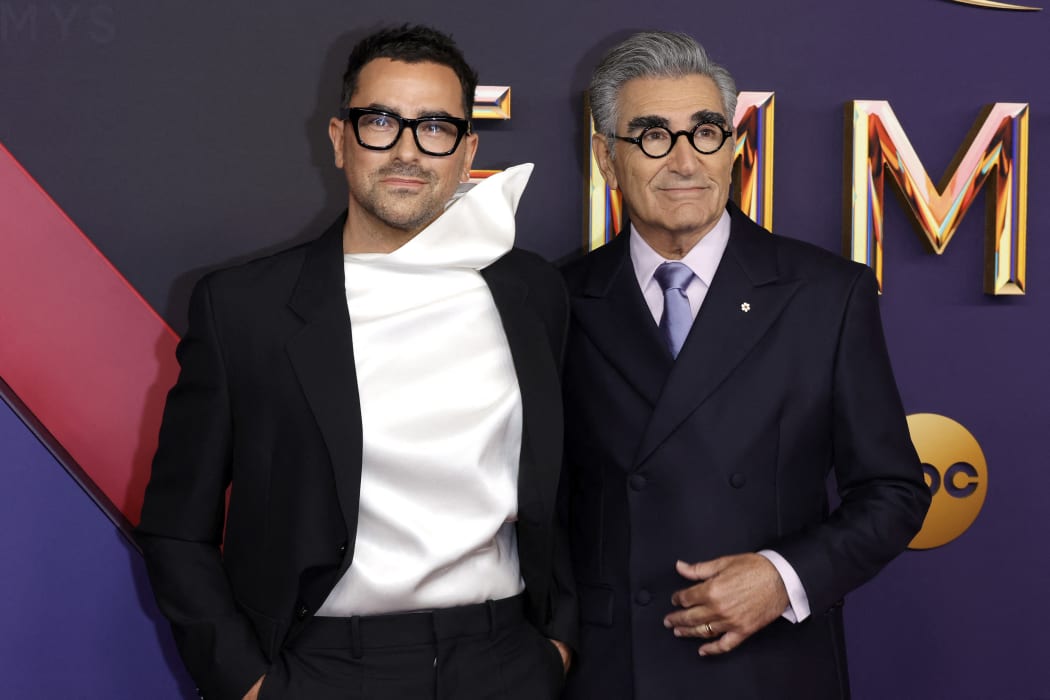 LOS ANGELES, CALIFORNIA - SEPTEMBER 15: (L-R) Dan Levy and Eugene Levy attend the 76th Primetime Emmy Awards at Peacock Theater on September 15, 2024 in Los Angeles, California.   Frazer Harrison/Getty Images/AFP (Photo by Frazer Harrison / GETTY IMAGES NORTH AMERICA / Getty Images via AFP)